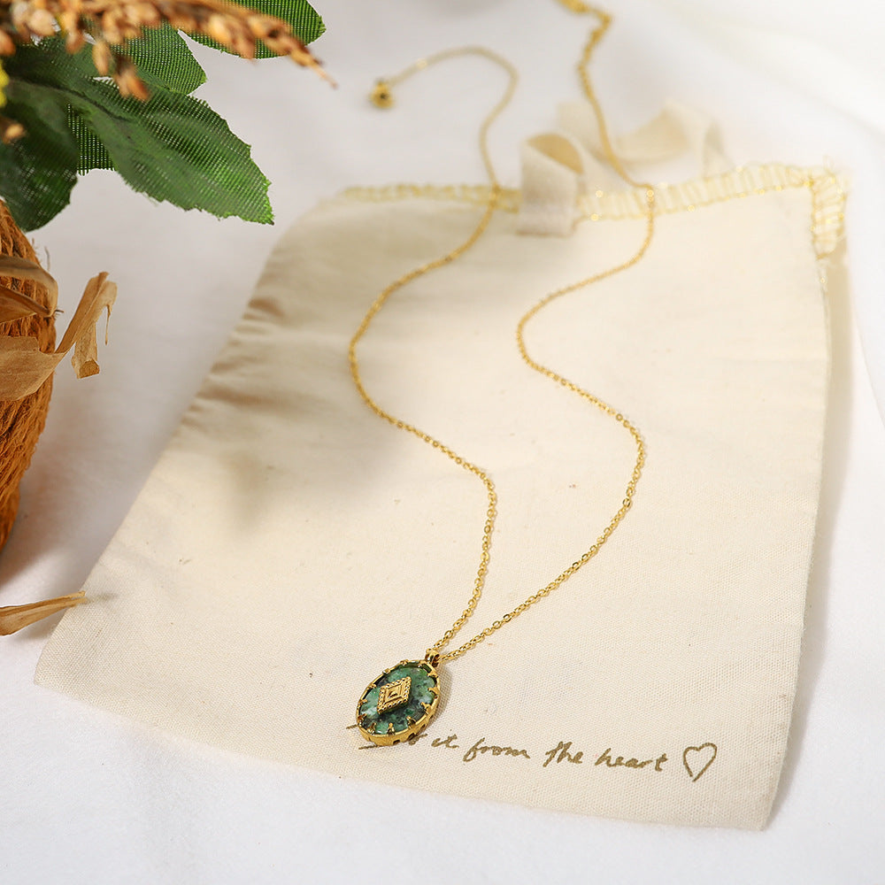 Oval Gemstone Pendant on Gold Chain Necklace